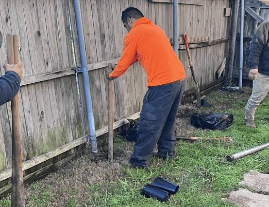 How to Fix a Loose Fence Post in Soil or Concrete